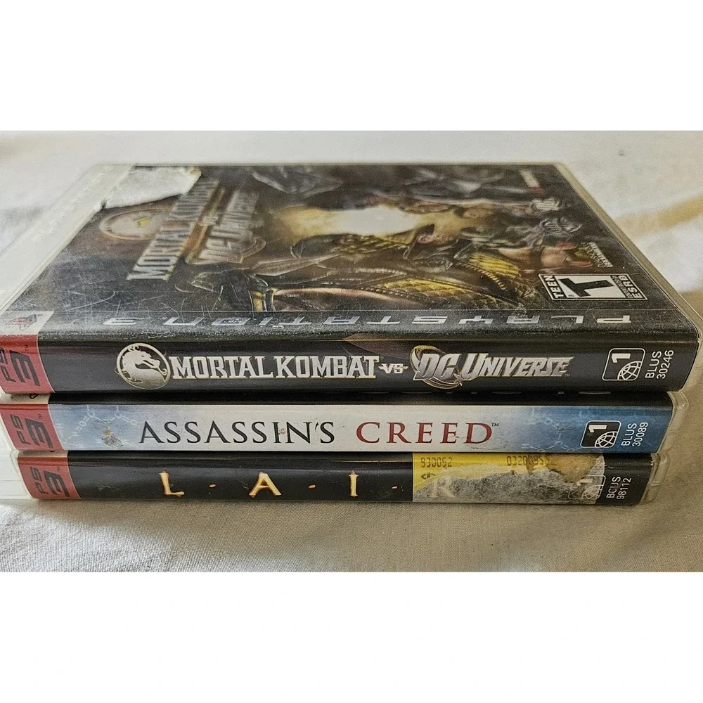 PS3‎ Lot of 3 Games Assassin's Creed Mortal Kombat vs DC Universe LAIR Complete